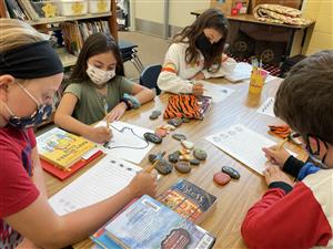 Fourth graders with story stones
