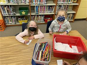 2nd graders making a bookmark