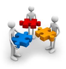 Three people with jigsaw puzzle pieces 