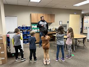 Mrs. Lowe's students playing games at the winter party