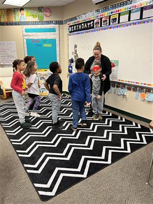 Mrs. Lowe's students playing games at the winter party