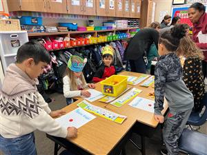 Students in Mrs. Sette's class playing games at the winter party