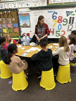 Mrs. Jordan's class making crafts at the winter party