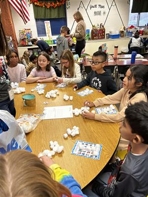 Students in Mrs. Jordan't class playing bingo 