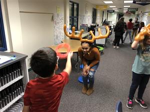 Mrs. Curran's class playing games at the winter party