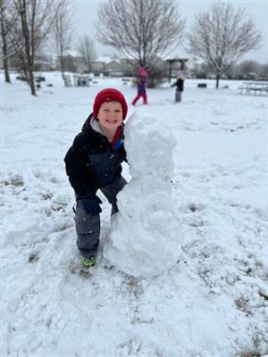 outside recess making snowmen