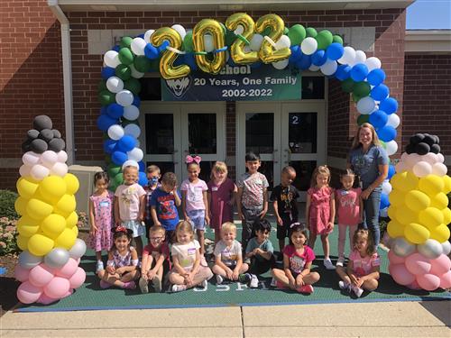Mrs Rainaldi and her kindergarten Students