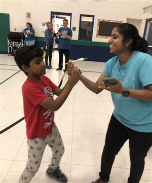 STARS student and his mom at family night