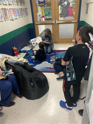 STARS students listing to stories