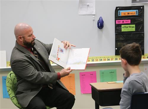 Dr. Sparlin reading to 5th grade classroom
