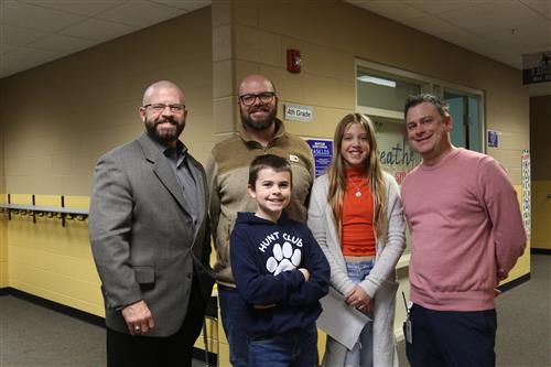 Dr. Sparlin, Mr. Rinaldi, Mr. Meismer, Easton Neale, and Ella Bailey