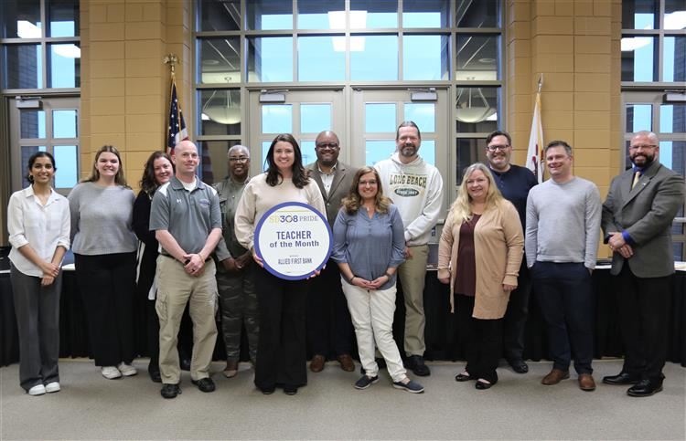 image of PRIDE teacher winners with BOE members and Dr. Sparlin