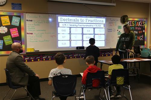 Dr. Sparlin in Decimals to Fractions instruction