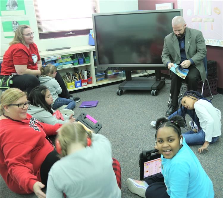 Dr. Sparlin reading snowman book