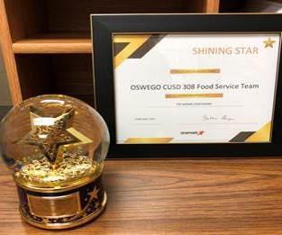Shining Star Award on Desk