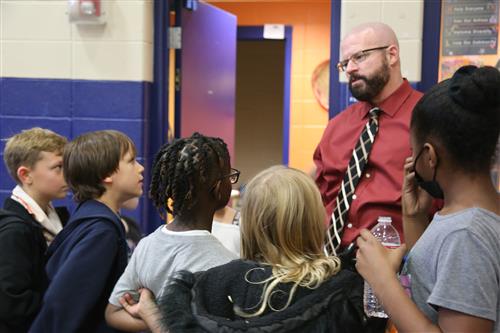 Dr. Sparlin with students from pe class