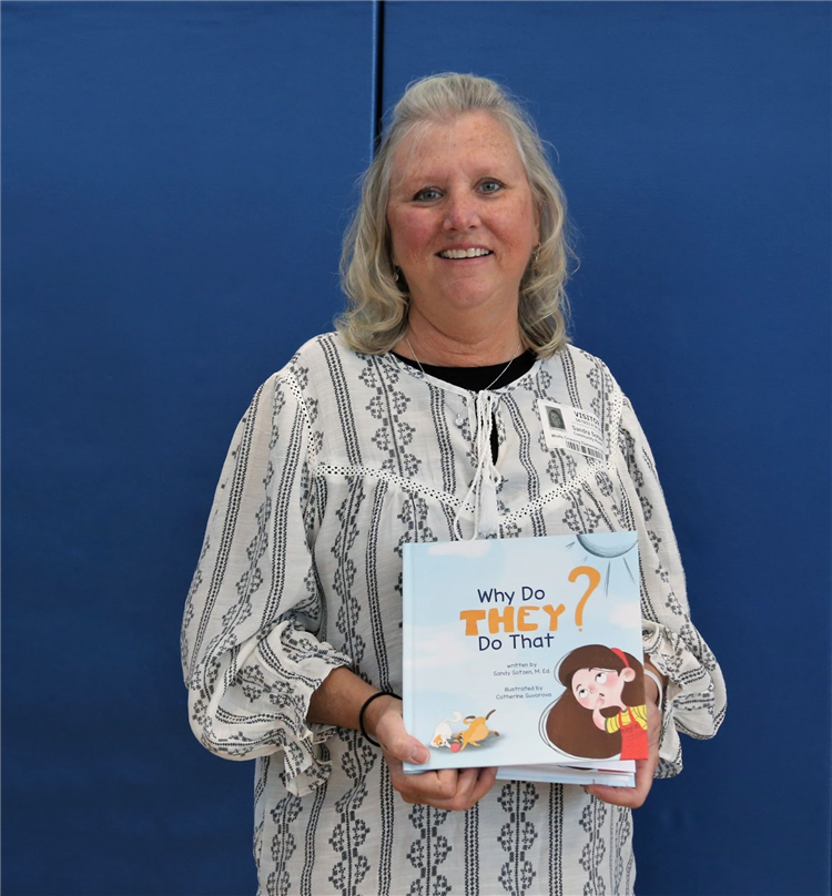 picture of author Sandy Sotzen holding her book