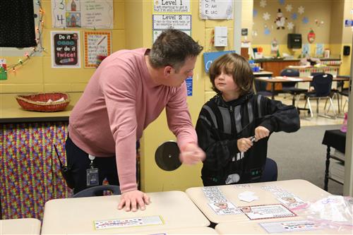 Mr. Oreilly with student in Math Rotations