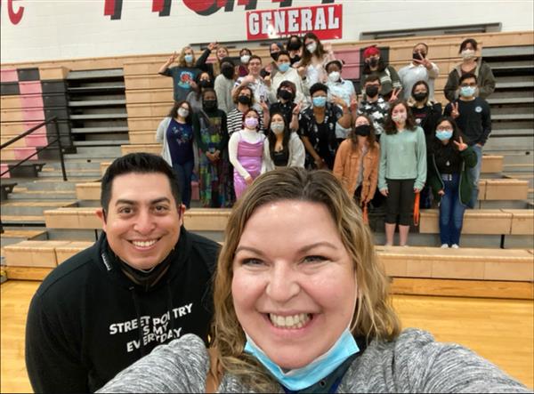 Literary Festival Coaches Tim Ochoa (OE) and Erin Holtz (OHS) stand proudly with the SD308 Lit Fest students during the April 2022 festival held at Yorkville High School.