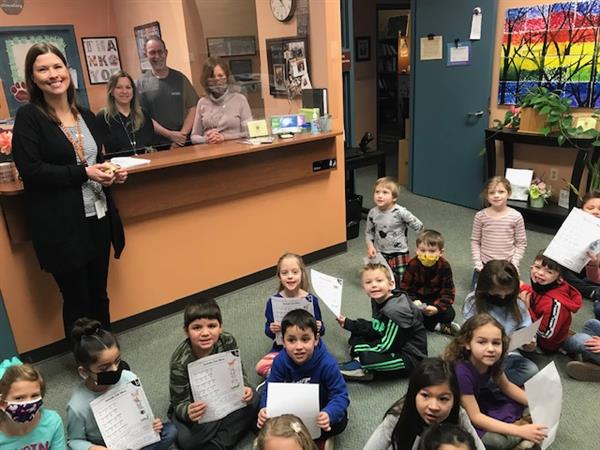 Mrs. Grauer's class reading to the office