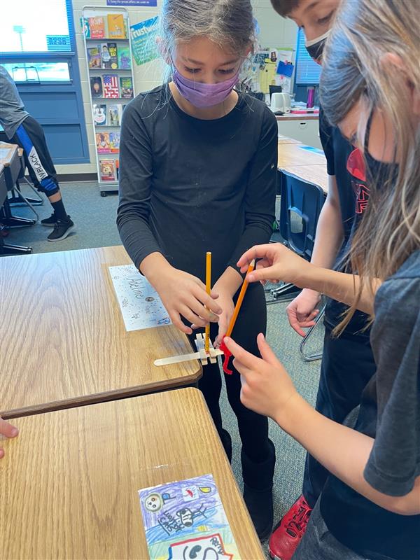 STEM Fun - Balancing a pencil on a Popsicle stick