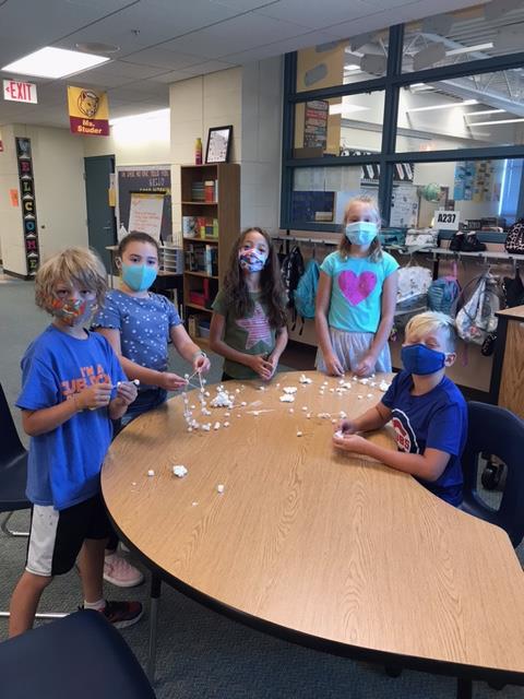 Ms. Studer's 4th grade class creating marshmallow towers