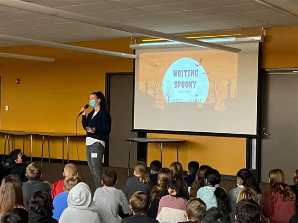 Lindsay Currie, author, speaks to 6th grade students