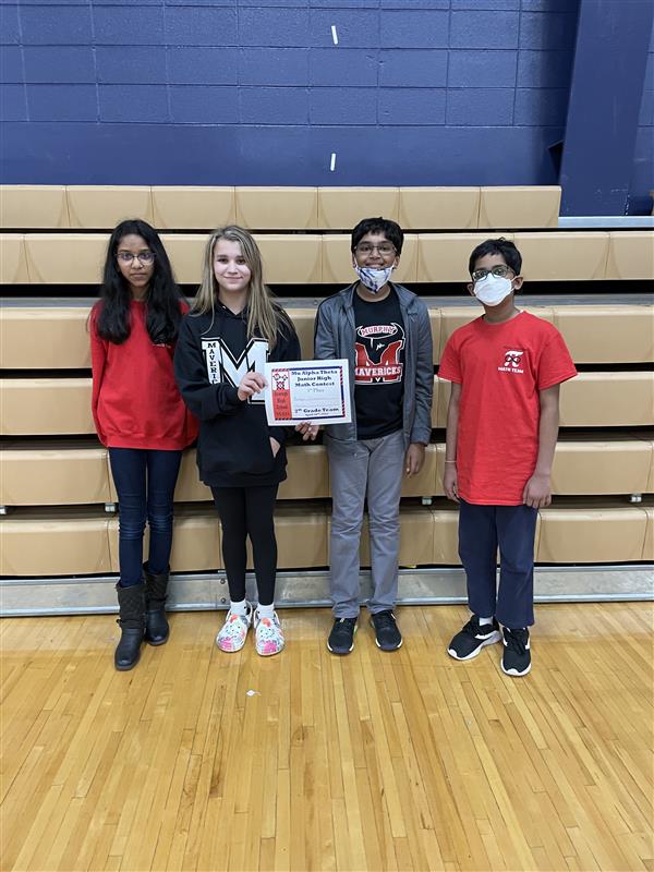 Kushan Bonela, Daiwik Muralidharan, Shirya Rao and Emerson McManis stand with certfiicate