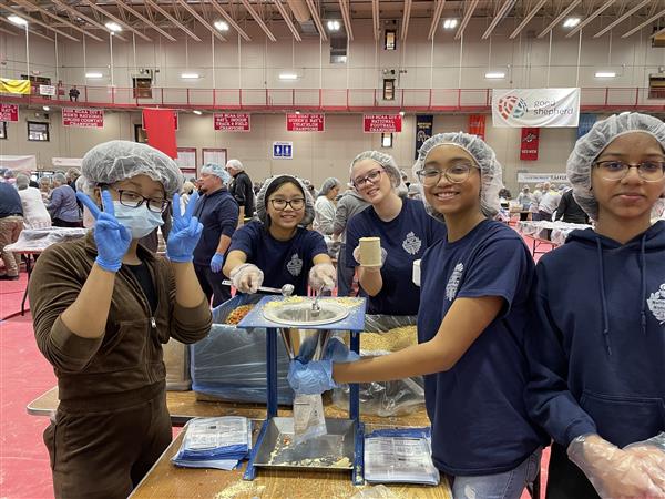 Several students pack up food