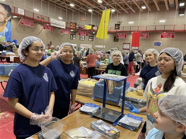 Several students pack up food