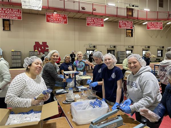 Several students pack up food