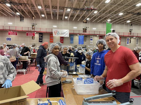 Several students pack up food