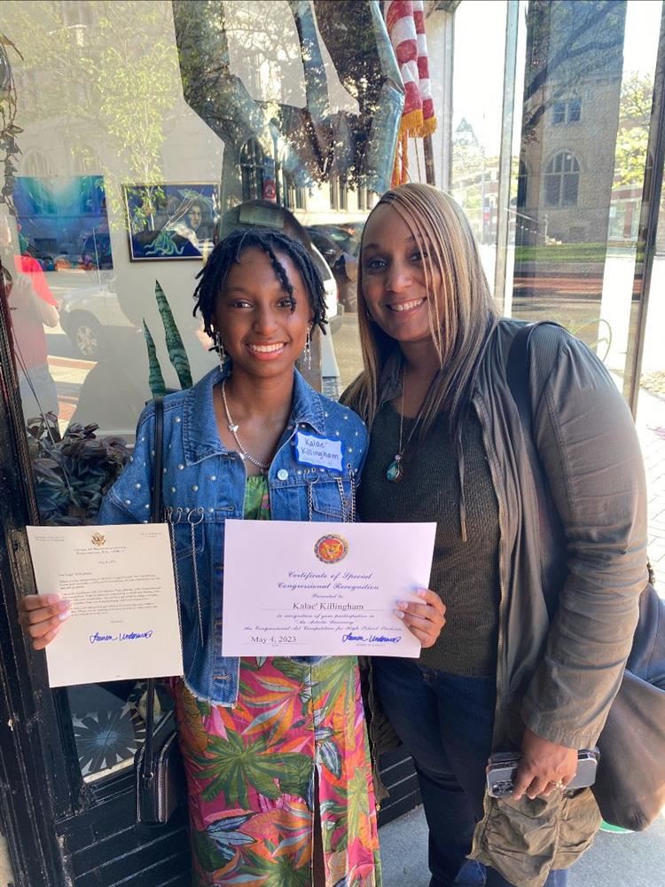 Kalae with guardian and certificate of recognition