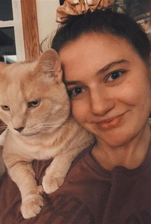 Miss Sowa and her cat.