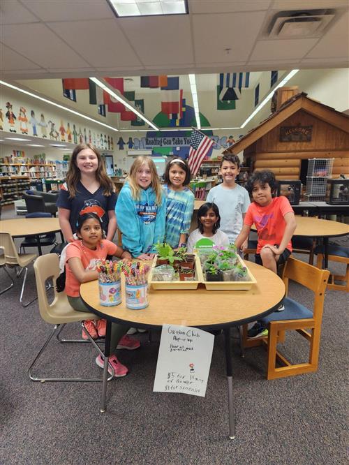Garden club members selling items at the pop up shop