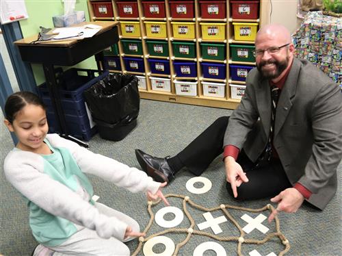 Student playing Dr. Sparlin tic-tac-toe