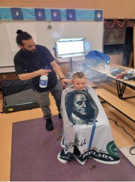 student receiving misting