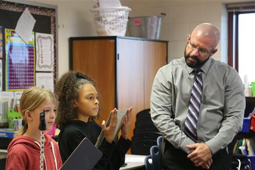 Dr. Sparlin listening to debate